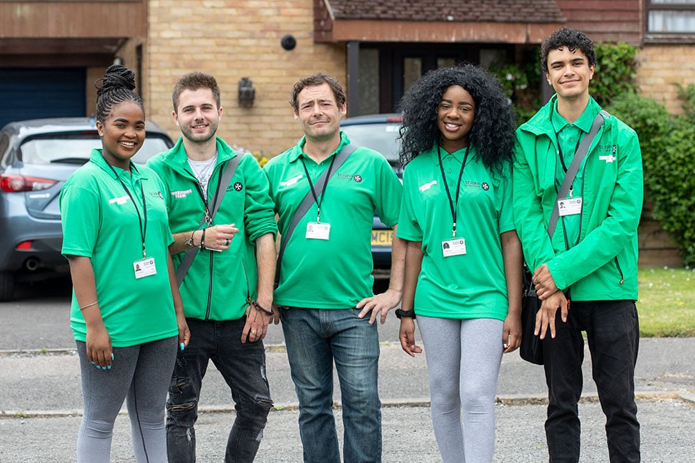 Group of Wesser fundraisers standing together wearing St John Ambulance branded t-shirts.