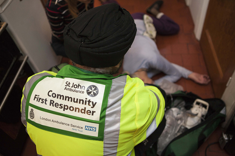 Community first responder helps a patient